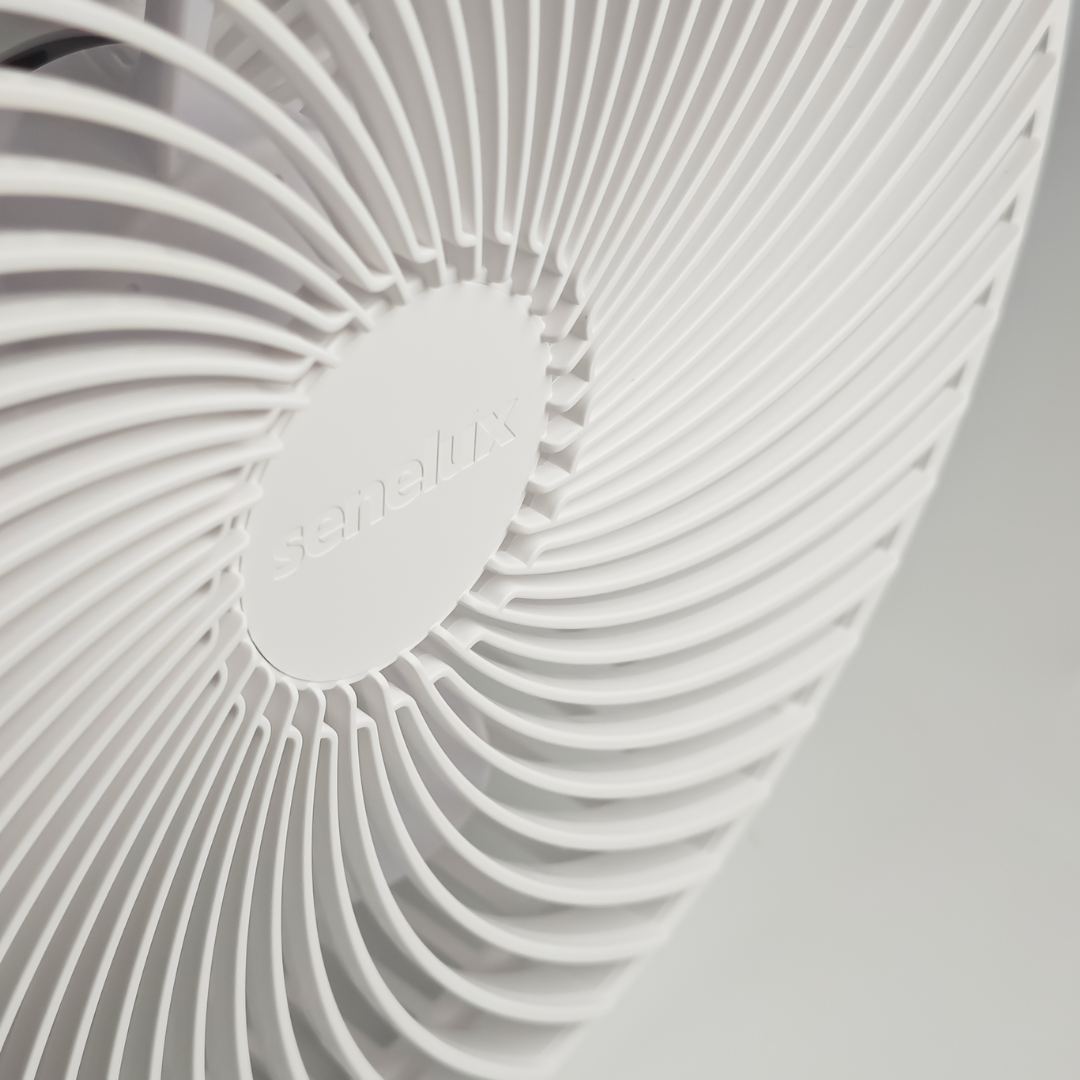 A close up of the Senelux logo on the Senelux 10 inch wall mounted fan